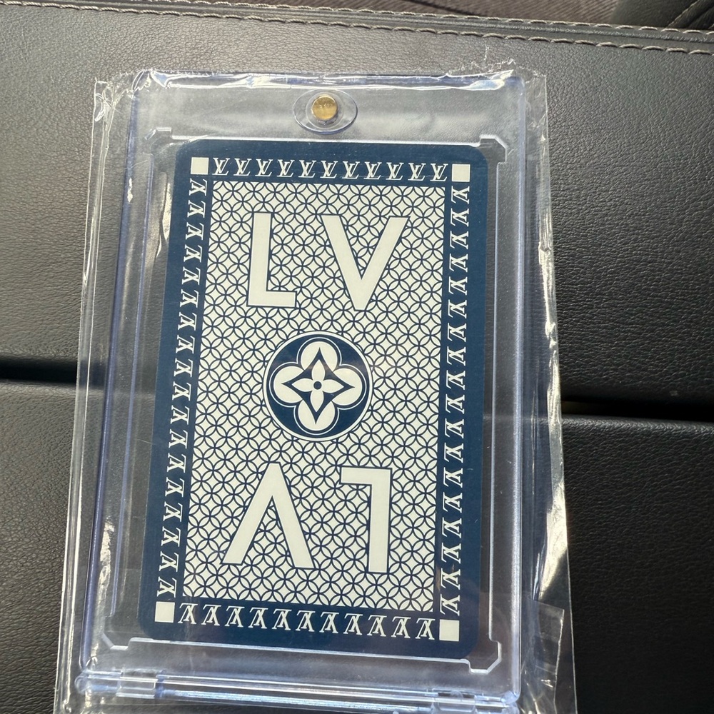 Authentic Louis Vuitton Navy and Cream playing card in protective case